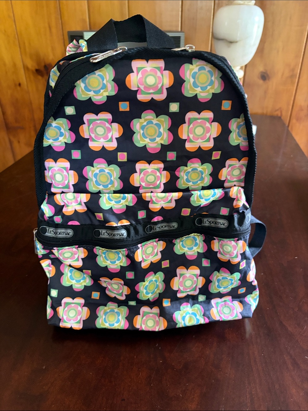 Lesportsac Black Backpack with Pink, Green, Blue & Yellow Floral Geo Print